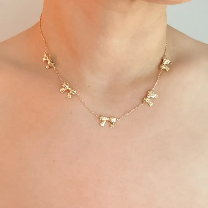 Gold Bow Festival Necklace