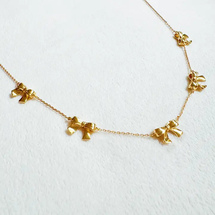 Gold Bow Festival Necklace